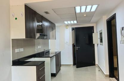 Apartment - Studio - 1 for rent in Tower 8 - Al Reef Downtown - Al Reef - Abu Dhabi