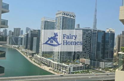 Apartment - 1 - 1 for rent in Mayfair Residency - Business Bay - Dubai