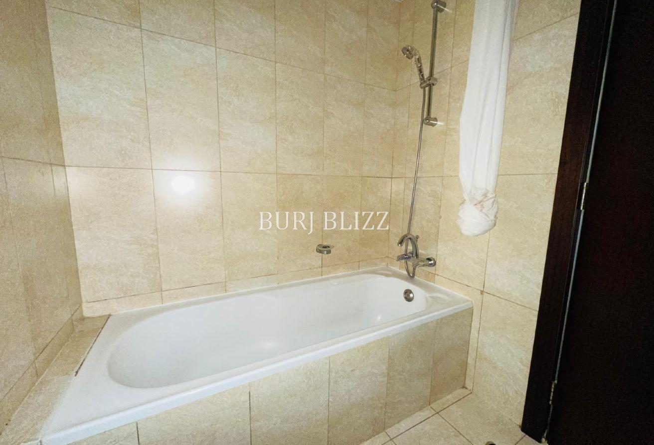 Spacious 1BR | Prime Location | Community View photo 11
