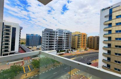 Apartment - 1 Bedroom - 2 Bathrooms for rent in Topaz Residence 1 - Topaz Residence - Dubai Silicon Oasis - Dubai
