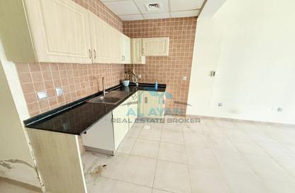 Apartment - Studio - 1 Bathroom for rent in Hamza Tower - Dubai Sports City - Dubai