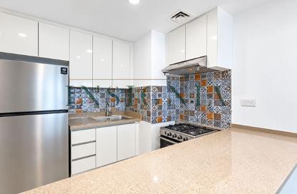 Apartment - 1 - 1 for rent in Rabdan Building - Motor City - Dubai