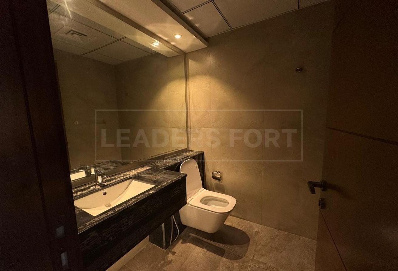 Elegant 1BR | Community View | Semi-Furnished photo 8