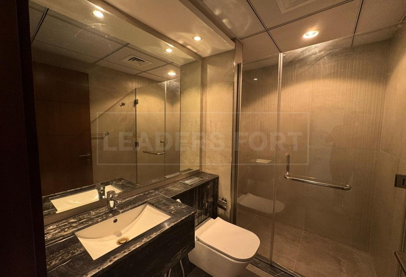 Elegant 1BR | Community View | Semi-Furnished photo 6