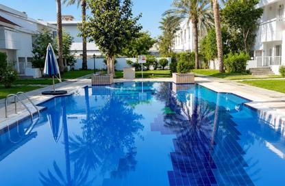 Villa - 4 Bedrooms - 4 Bathrooms for rent in The Falcon Villas - Al Garhoud - Dubai