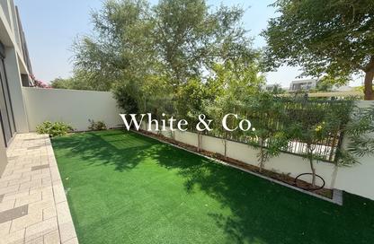 Townhouse - 4 - 5 for rent in Aura Gardens - Tilal Al Ghaf - Dubai