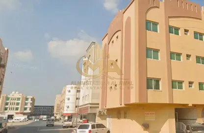 عمارة بالكامل للبيع في مجمع مويلح - تجارية مويلح - الشارقة