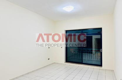 Apartment - Studio - 1 Bathroom for rent in Dunes Village Building 14 - Dunes Village - Dubai Investment Park (DIP) - Dubai