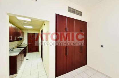 Apartment - Studio - 1 Bathroom for rent in Dunes Village Building 14 - Dunes Village - Dubai Investment Park (DIP) - Dubai