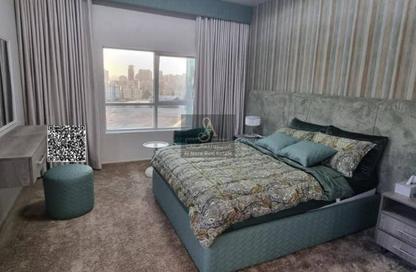 Apartment - 1 Bedroom - 2 Bathrooms for sale in Orient Tower 1 - Orient Towers - Al Bustan - Ajman