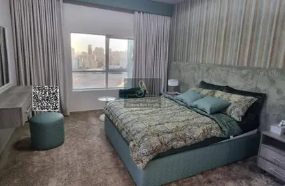 شقة - غرفة نوم - 2 حمامات للبيع في أورينت تاور 1 - أورينت تاور - البستان - عجمان