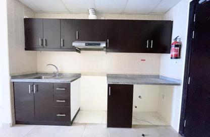 Apartment - Studio - 1 Bathroom for rent in Silicon Gates 1 - Silicon Gates - Dubai Silicon Oasis - Dubai