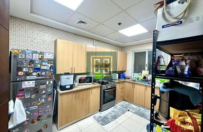 Apartment - 1 Bedroom - 2 Bathrooms for sale in Oakwood Residency - Dubai Production City (IMPZ) - Dubai