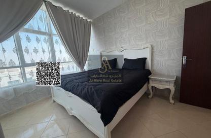 Apartment - 2 Bedrooms - 2 Bathrooms for sale in Orient Tower 1 - Orient Towers - Al Bustan - Ajman
