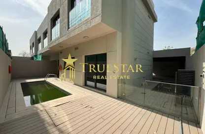 Villa - 4 Bedrooms - 5 Bathrooms for rent in Jumeirah 1 Villas - Jumeirah 1 - Jumeirah - Dubai