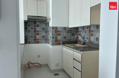 Apartment - 1 - 2 for rent in Rabdan Building - Motor City - Dubai