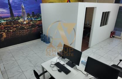 Shop - Studio for rent in Building Z04 - England Cluster - International City - Dubai