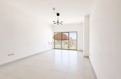 Apartment - 1 Bedroom - 2 Bathrooms for rent in Rabdan Building - Motor City - Dubai