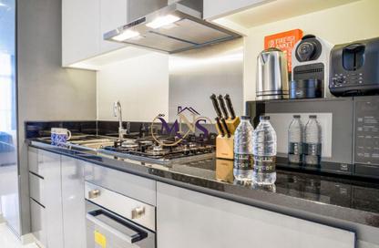 Apartment - Studio - 1 for rent in Damac Maison Prive A - Damac Maison Prive - Business Bay - Dubai