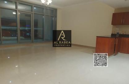 Apartment - 1 Bedroom - 2 Bathrooms for rent in Corniche Tower - Ajman Corniche Road - Ajman