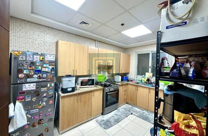 Apartment - 1 Bedroom - 2 Bathrooms for sale in Oakwood Residency - Dubai Production City (IMPZ) - Dubai
