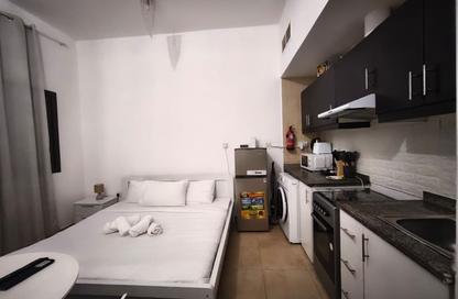 Apartment - Studio - 1 Bathroom for rent in Silicon Gates 1 - Silicon Gates - Dubai Silicon Oasis - Dubai