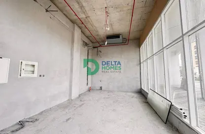 Shop - Studio for rent in Deansgate By Ade - Majan - Dubai Land - Dubai