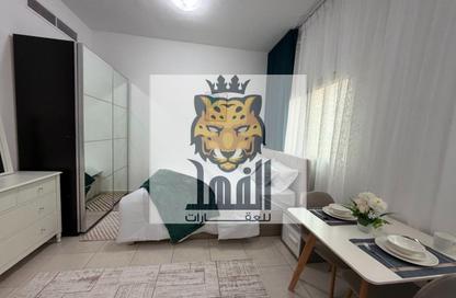 Apartment - Studio - 1 for rent in Corniche Tower - Ajman Corniche Road - Ajman