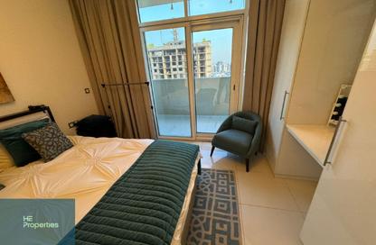 Apartment - 1 - 2 for rent in Ghalia Tower - District 18 - Jumeirah Village Circle - Dubai