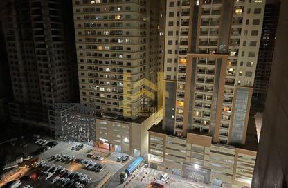 Apartment - 1 - 2 for sale in Lilies Tower - Emirates City - Ajman