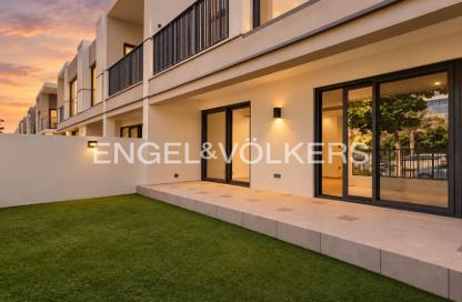 Townhouse - 3 - 4 for rent in Aura Gardens - Tilal Al Ghaf - Dubai