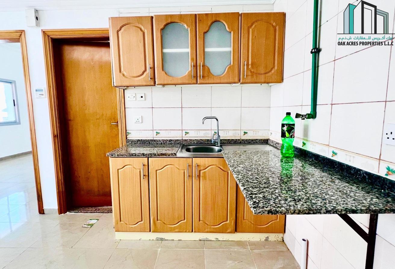 Spacious 1 BHK | Close to NMC Hospital | Family photo 3