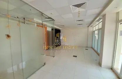 متجر - استوديو - 1 حمام للايجار في طراز أسباني - المدينة العالمية - دبي