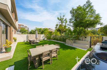 Townhouse - 4 - 5 for sale in Aura Gardens - Tilal Al Ghaf - Dubai