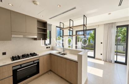 Townhouse - 4 - 4 for sale in Aura Gardens - Tilal Al Ghaf - Dubai