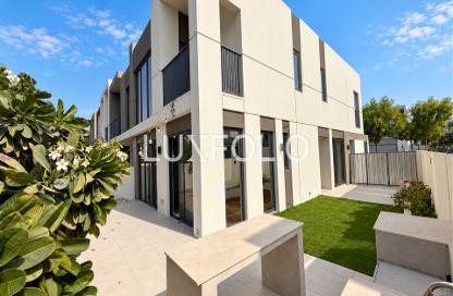 Townhouse - 4 - 4 for sale in Aura Gardens - Tilal Al Ghaf - Dubai