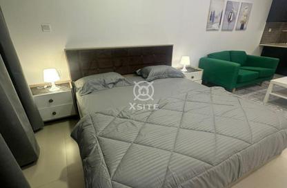Apartment - Studio - 1 Bathroom for rent in Modelux Tower 1 - International City Phase 2 - Al Warsan 4 - Al Warsan - Dubai