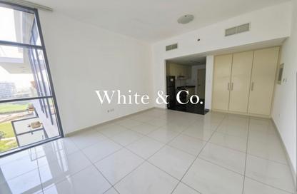 Apartment - Studio - 1 for rent in Golf Horizon A - Golf Horizon - Golf Town - Damac Hills - Dubai