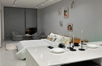Apartment - Studio - 1 for rent in Blue Waves Tower - Dubai Land Residence Complex - Dubai