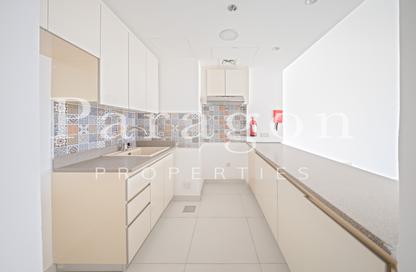 Apartment - 1 - 2 for sale in Rabdan Building - Motor City - Dubai