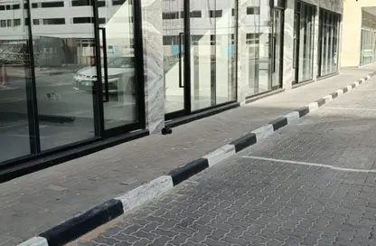 مركز أعمال - استوديو - 2 حمامات للايجار في الزاهية - تجارية مويلح - الشارقة