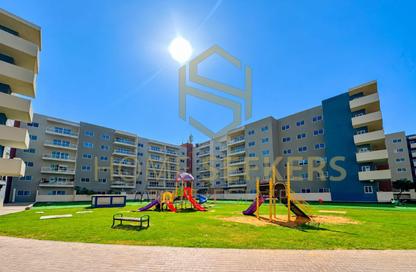 Apartment - 3 - 4 for sale in Tower 21 - Al Reef Downtown - Al Reef - Abu Dhabi