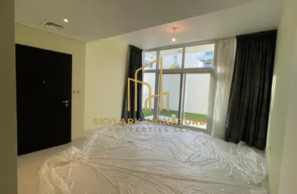 Townhouse - 3 Bedrooms - 5 Bathrooms for sale in Aurum Villas - Sanctnary - Damac Hills 2 - Dubai