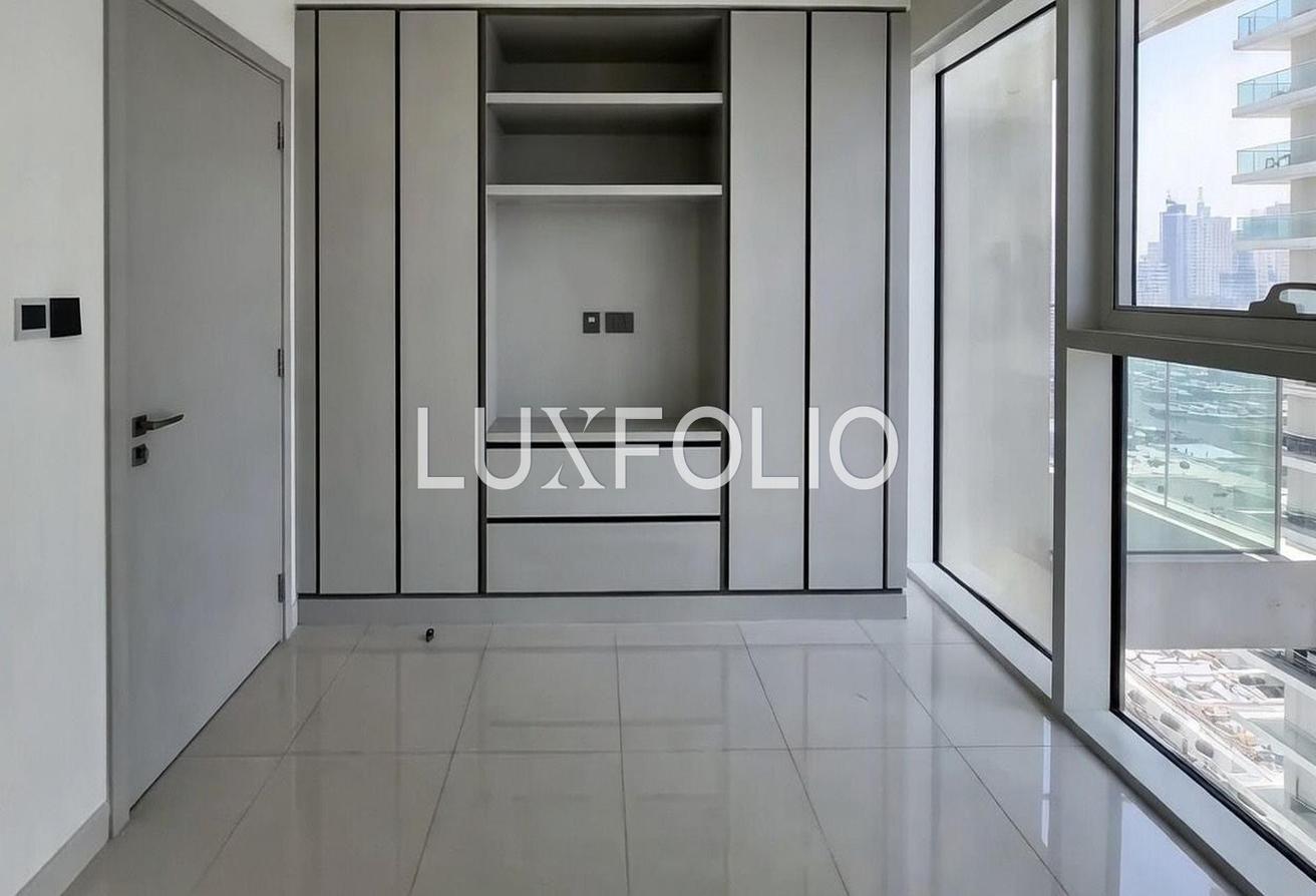 Marina View | Unfurnished | Private Beach Access photo 5