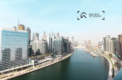 النزل و الشقق الفندقية - 1 حمام للبيع في برج دولفين - الخليج التجاري - دبي