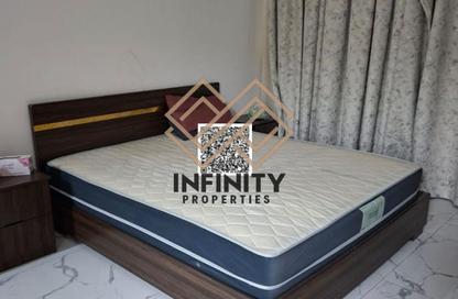 Apartment - 1 - 2 for sale in Oasis Tower 2 - Oasis Tower - Al Rashidiya 1 - Al Rashidiya - Ajman