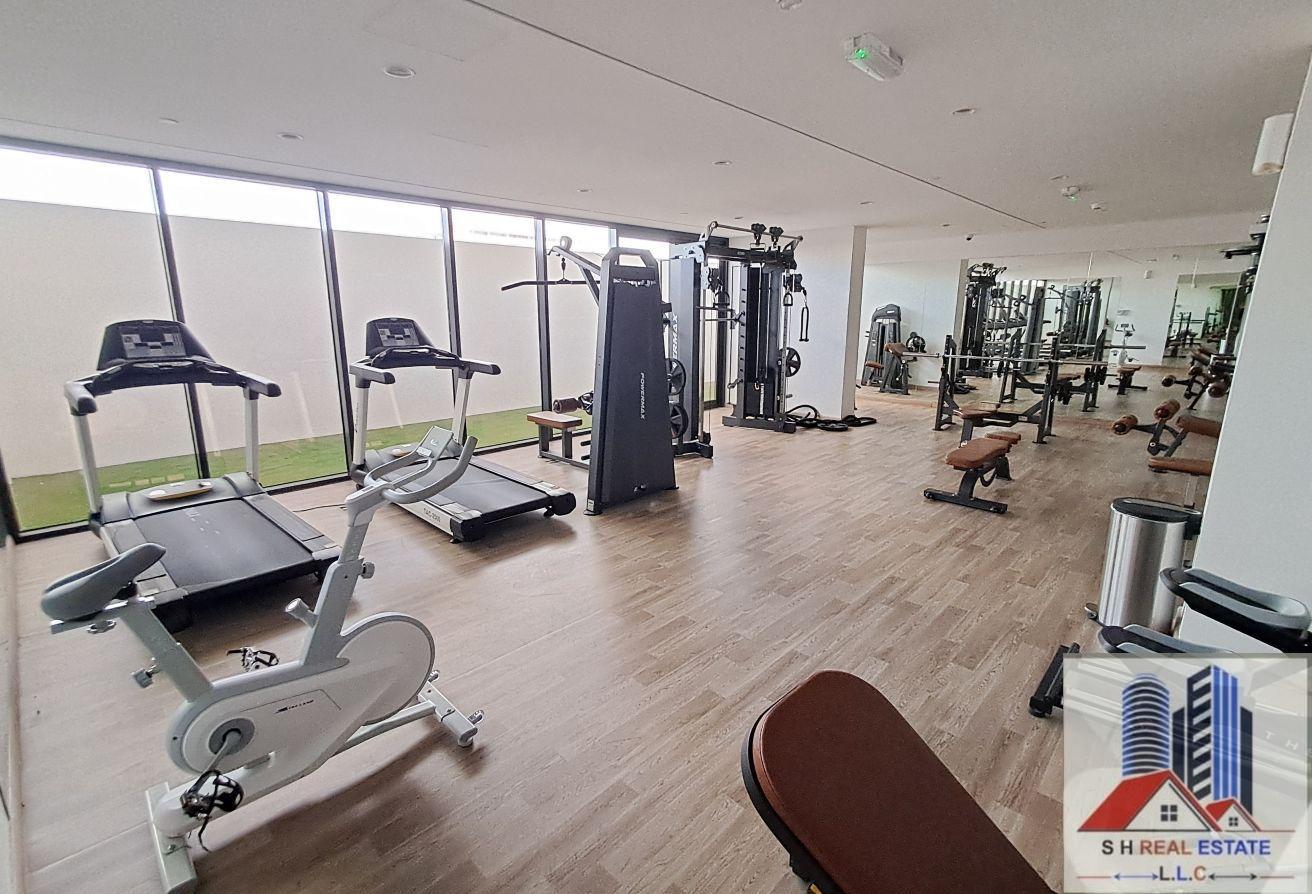 1 BR Apartment in Liwan with Pool and Gym photo 11