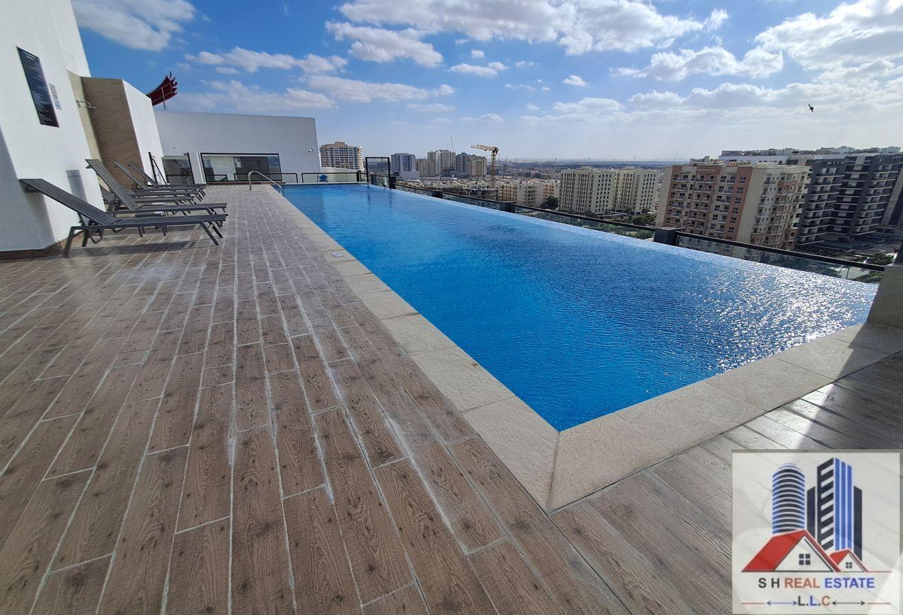 1 BR Apartment in Liwan with Pool and Gym photo 9