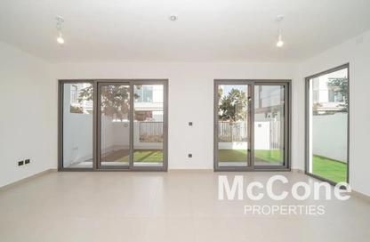 Townhouse - 4 - 5 for rent in Aura Gardens - Tilal Al Ghaf - Dubai