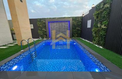 Villa - 5 - 7 for sale in Kabbali Hills - Al Helio 2 - Al Helio - Ajman Villa - 5 - 7 for sale in Kabbali Hills - Al Helio 2 - Al Helio - Ajman